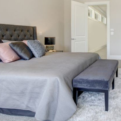 Why You Should Add a Bench at the End of Your Bed