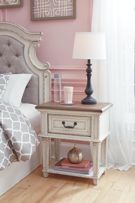 Realyn Full Upholstered Panel Bed and Nightstand